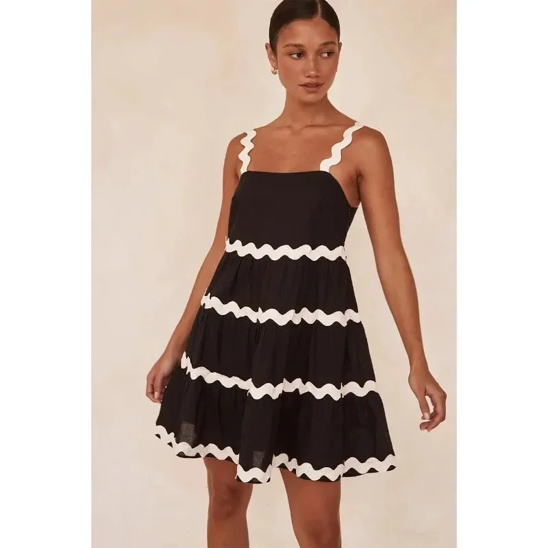 Day dress with pastel colors for soft vibe -Coya Statement Holiday Dress