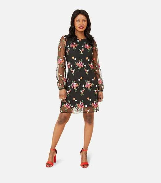 Women's wrap dresses with pastel colors-Embroidered Floral Tunic Dress