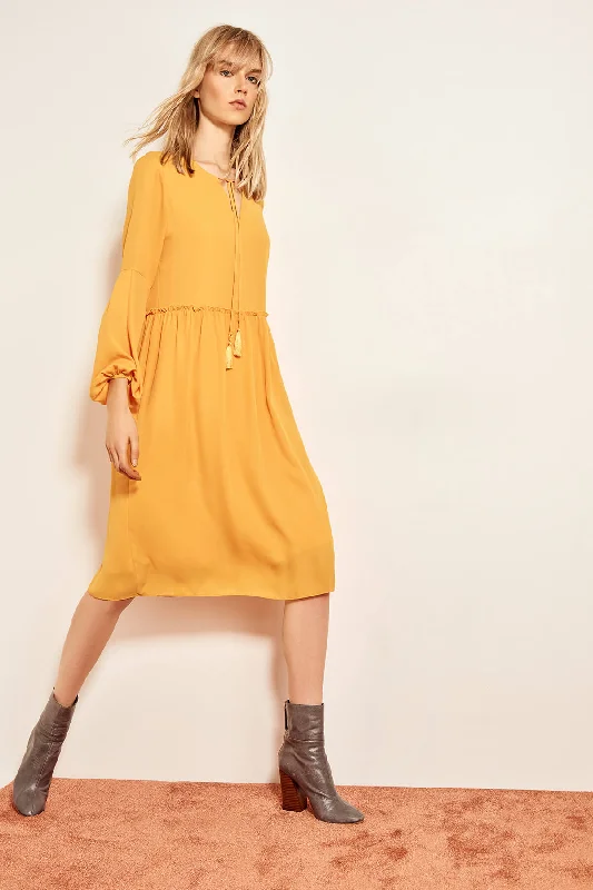 Women’s ruffled mermaid prom dress for a dramatic effect -Mustard Tasseled dress