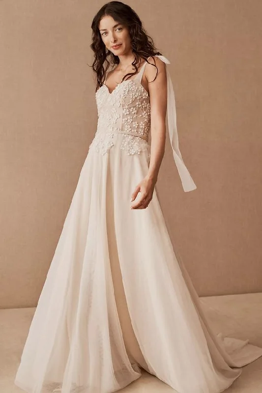 Wedding dress with high-low hemline for dramatic flair -BHLDN Especia Cerecino Gown