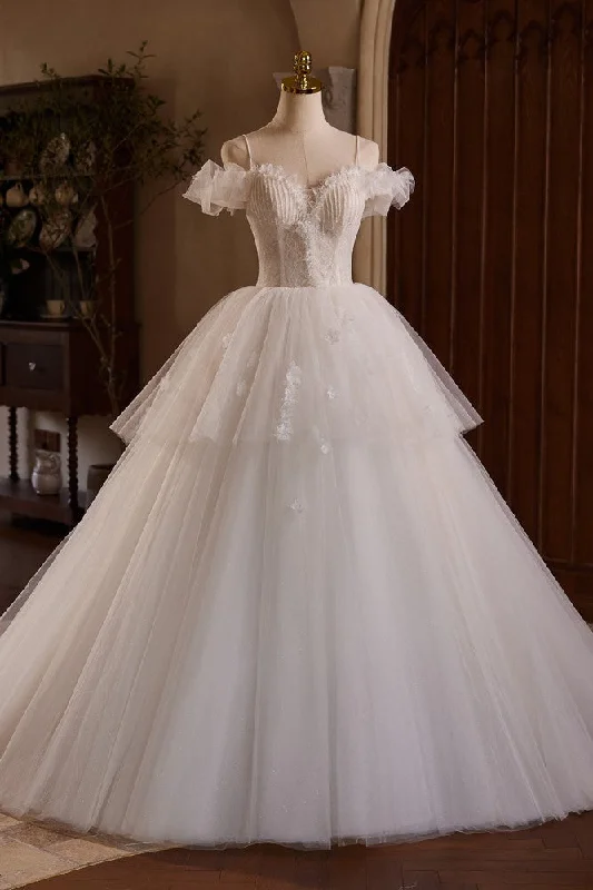 Wedding dress with delicate crystal details for shine -Elegant Layers Tulle Spaghetti Straps Beading Wedding Gowns Wedding dress with delicate crystal details for shine -Elegant Layers Tulle Spaghetti Straps Beading Wedding Gowns